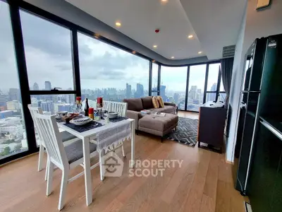 Stunning corner unit with panoramic city views and modern open living space.