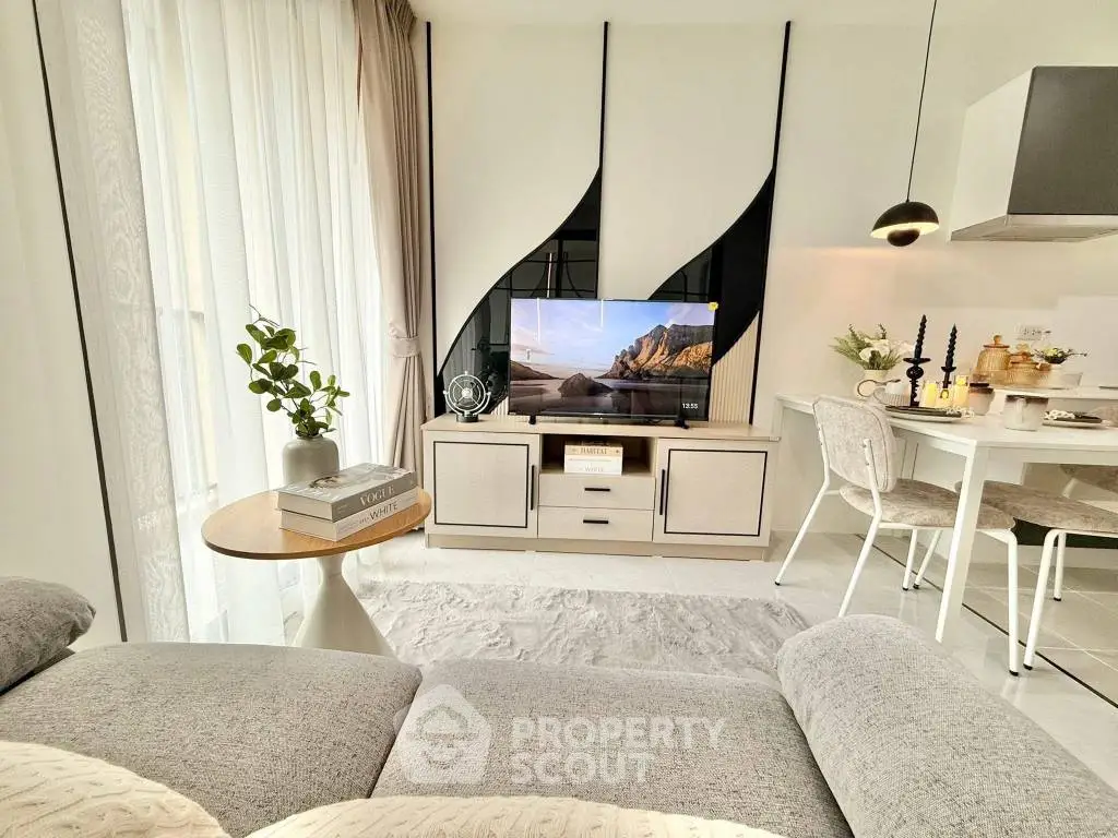 Modern living room with stylish decor and open kitchen layout