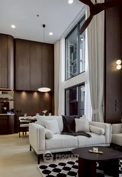 Luxurious modern living room with high ceilings and elegant decor