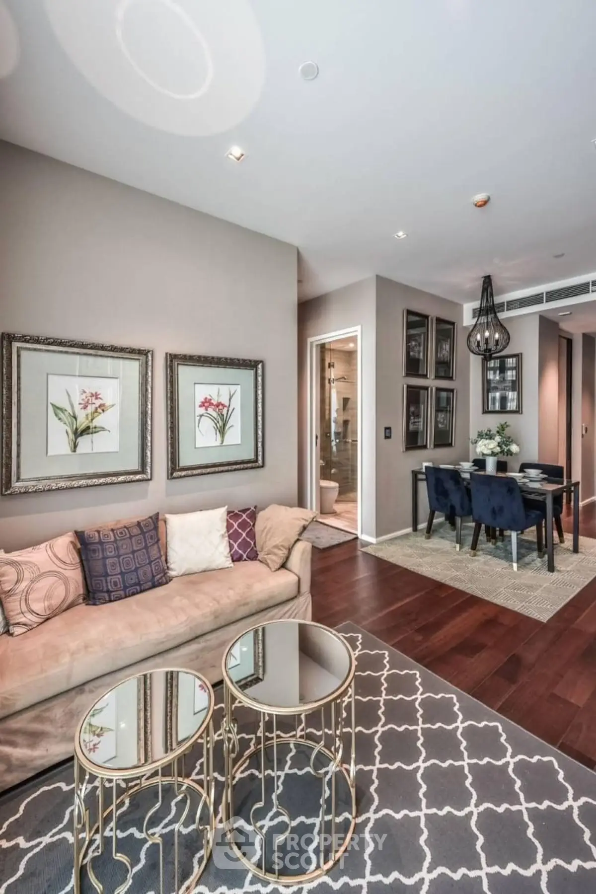 Elegant living room with stylish decor and dining area in modern apartment