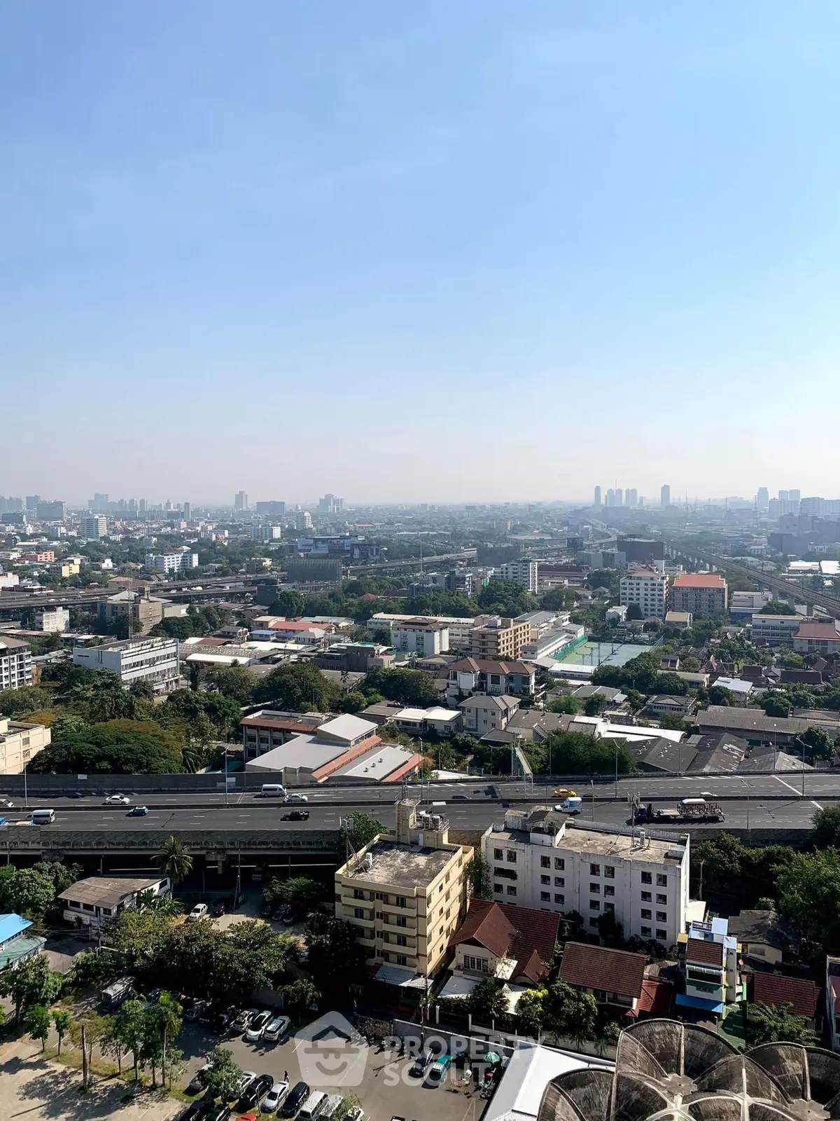 Stunning cityscape view from high-rise building showcasing urban landscape and skyline.