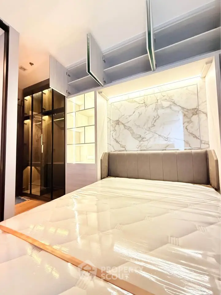 Luxurious bedroom with modern design and elegant marble accents