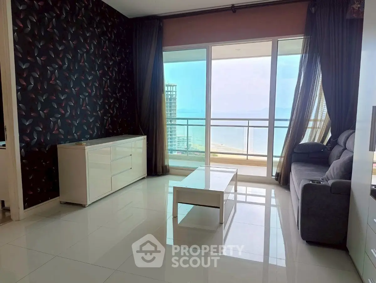 Spacious living room with stunning ocean view and modern decor