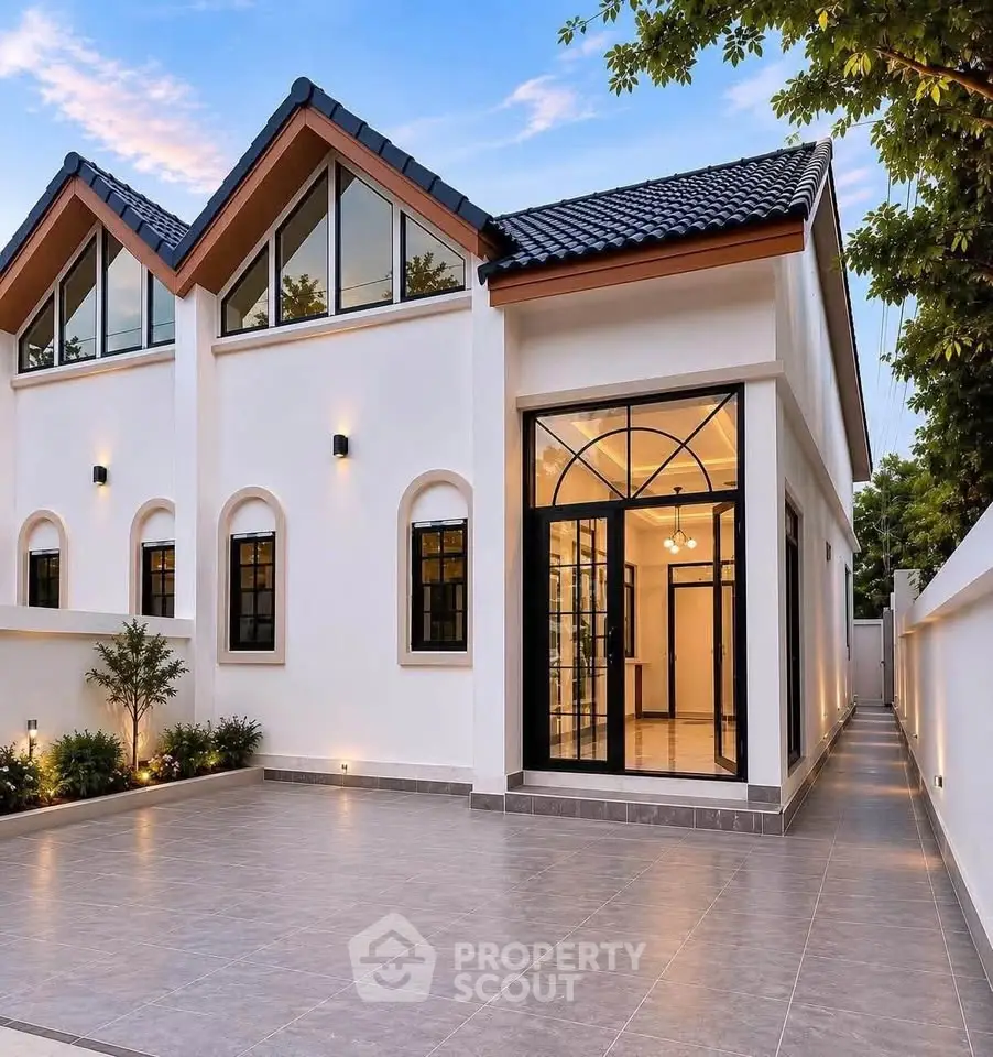 Stunning modern home exterior with elegant architecture and spacious driveway