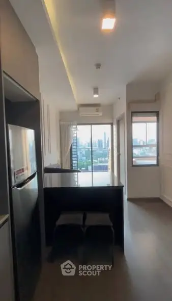 Modern kitchen with city view and sleek design