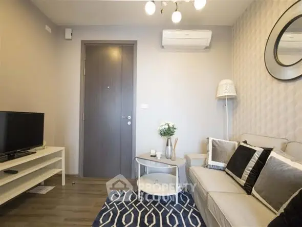 Modern living room with stylish decor and air conditioning