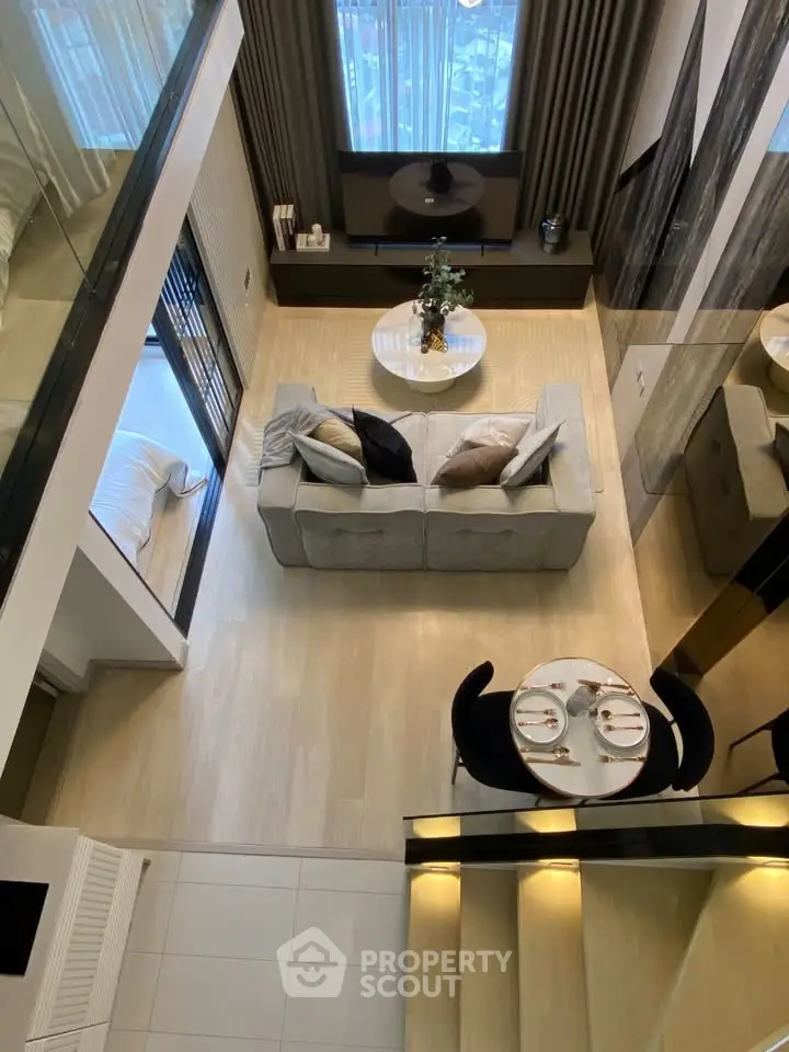 Modern duplex living room with stylish decor and cozy seating area