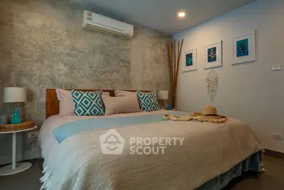 Cozy bedroom with stylish decor and air conditioning in modern apartment