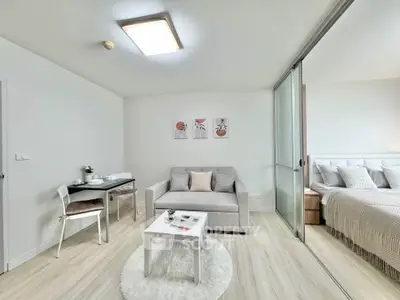 Modern living room with cozy sofa and dining area in bright apartment