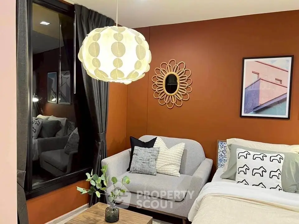 Cozy living room with modern decor and stylish lighting, perfect for relaxation and entertaining.