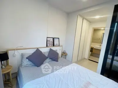 Modern bedroom with ensuite bathroom and stylish decor