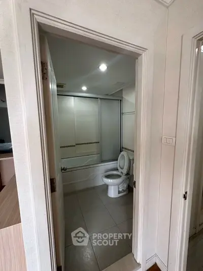 Modern bathroom with glass shower and sleek design
