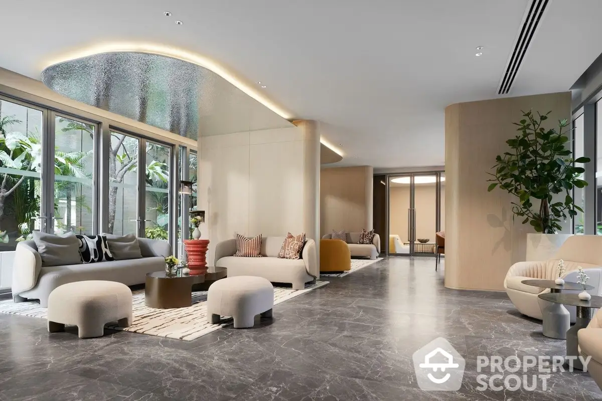 Luxurious spacious living room with modern design, elegant furniture, and floor-to-ceiling windows offering abundant natural light.