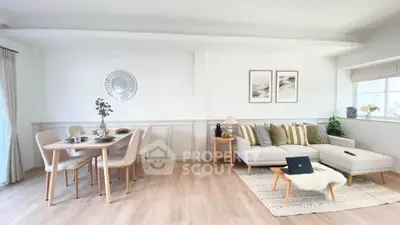 Spacious modern living room with elegant dining area and cozy decor