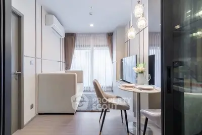 Modern living room with elegant dining area and stylish lighting