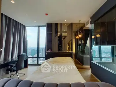 Luxurious bedroom with stunning city view and modern furnishings