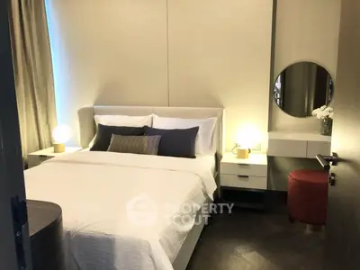 Cozy modern bedroom with elegant decor and ambient lighting