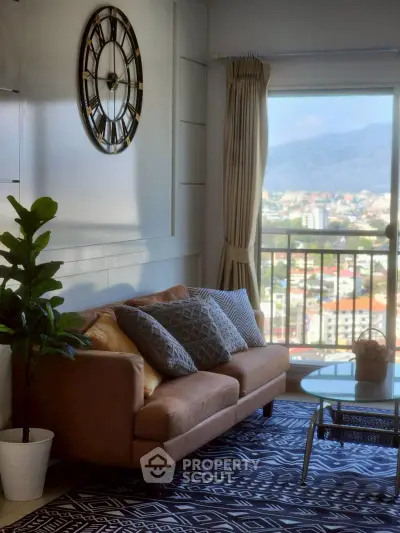 Stylish living room with a cozy sofa, large clock, and stunning city view from the balcony.