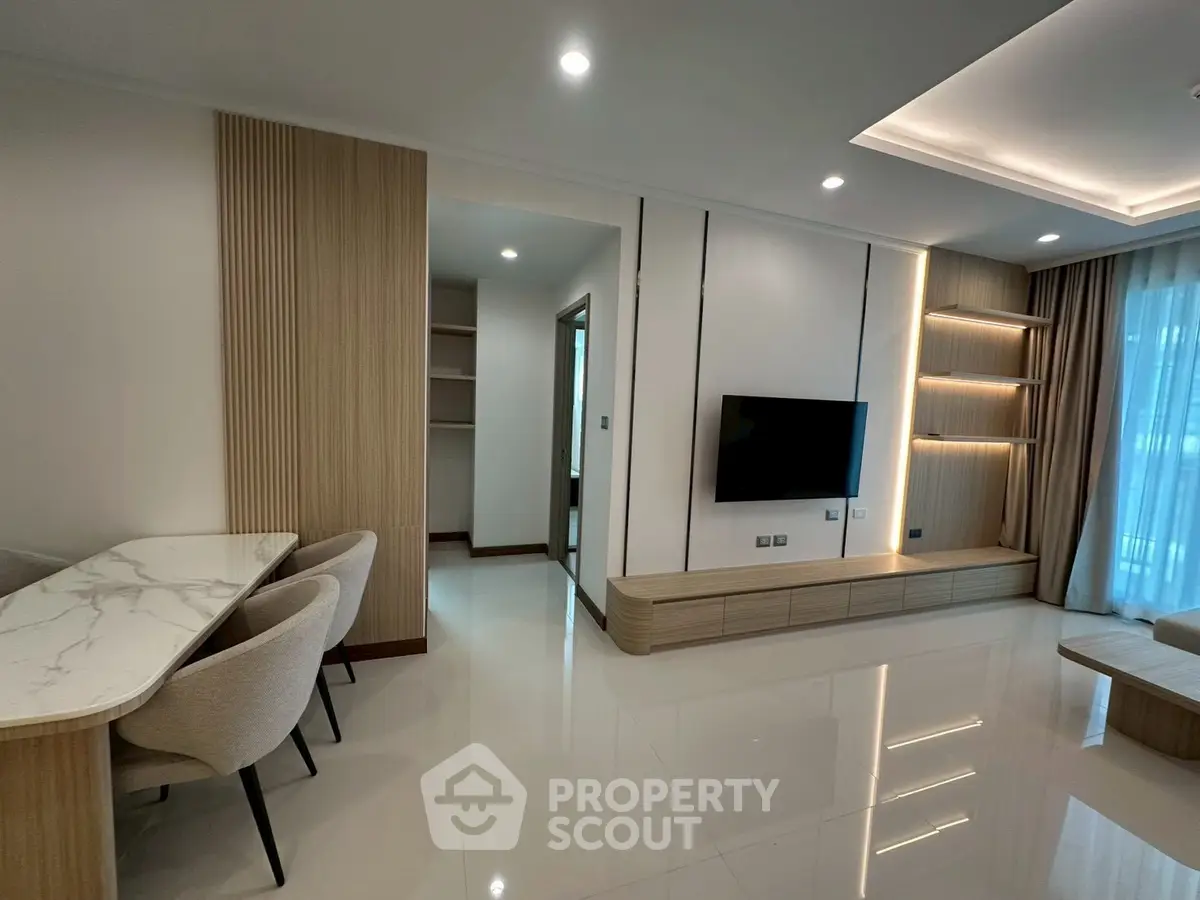 Modern living room with sleek design and built-in TV unit