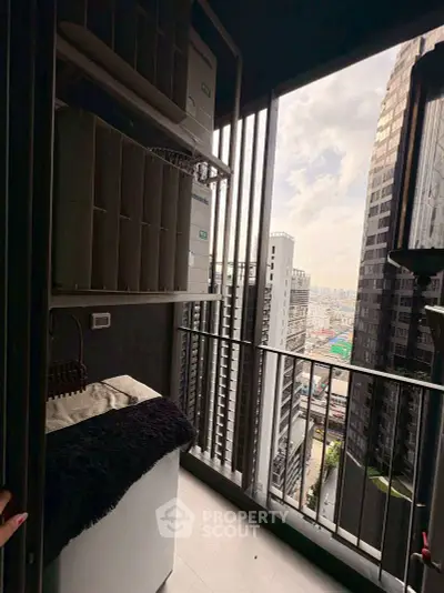 High-rise balcony with city view and modern design