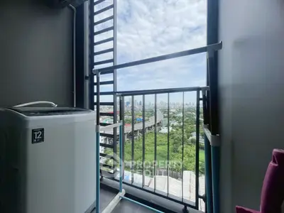 High-rise balcony with washing machine and stunning city view