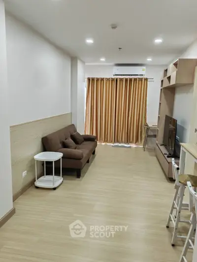 Modern living room with cozy sofa and stylish decor