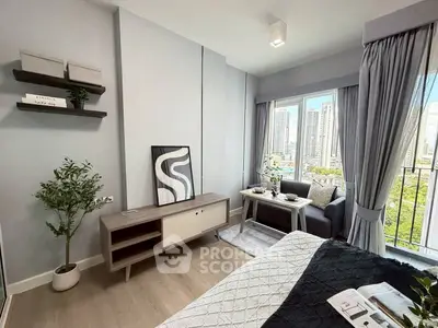 Modern bedroom with city view, stylish decor, and natural light