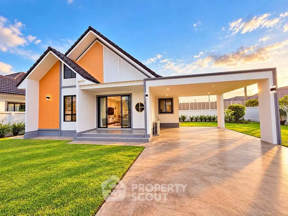 Stunning modern house with spacious driveway and lush green lawn, perfect for family living.