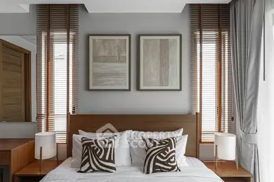 Modern bedroom with stylish decor and natural light