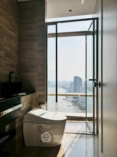 Luxurious bathroom with stunning city view and modern amenities.