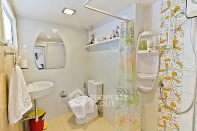 Bright and modern bathroom with shower and stylish decor