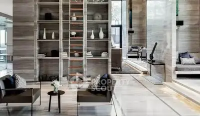 Luxurious modern living room with elegant decor and high ceilings, featuring a stylish open layout and sophisticated furnishings.