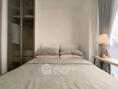 Cozy bedroom with modern decor and natural light