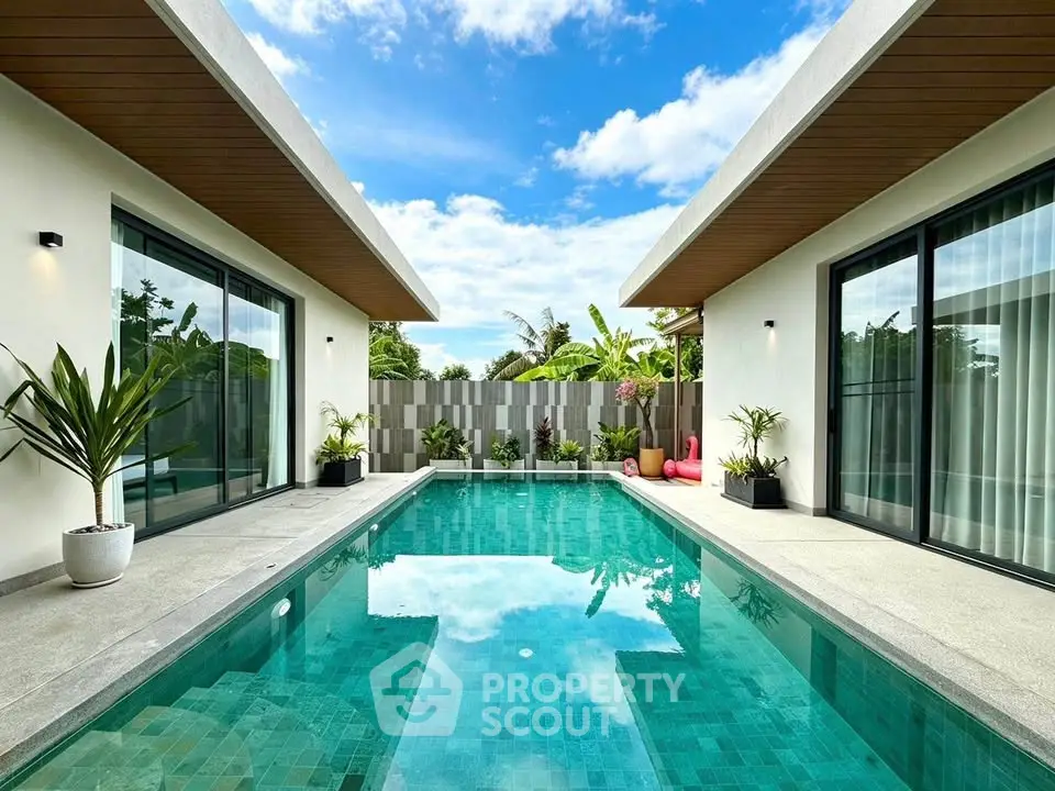 Luxurious modern villa with private pool and tropical garden view