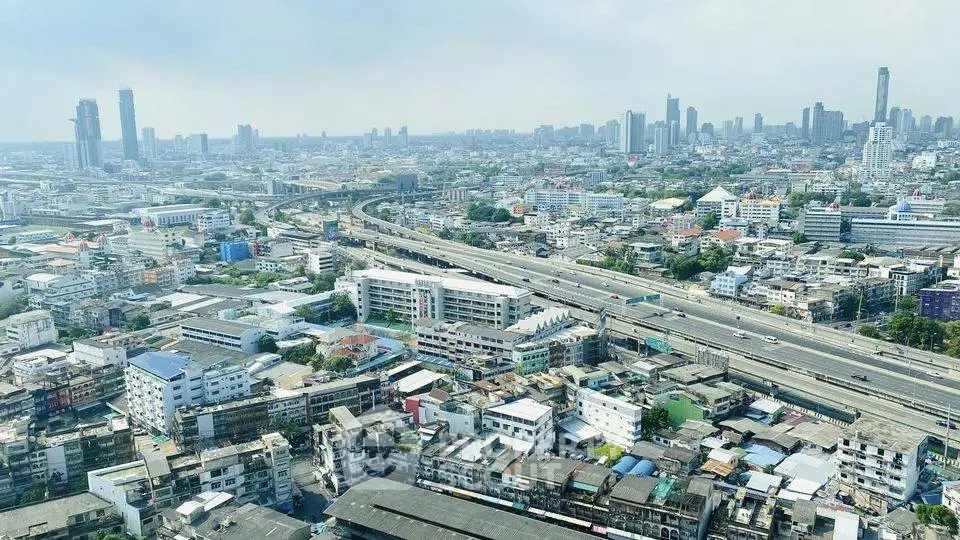 Stunning cityscape view showcasing urban skyline and highway connectivity