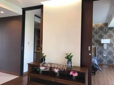 Stylish modern living room with elegant decor and sliding doors
