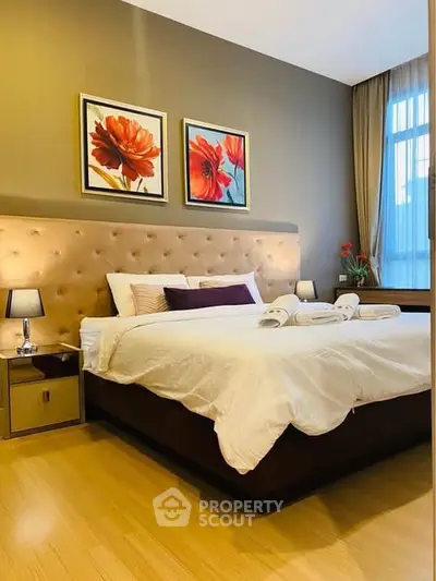 Luxurious bedroom with elegant decor and natural light
