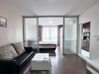 Modern studio apartment with open layout and stylish furnishings