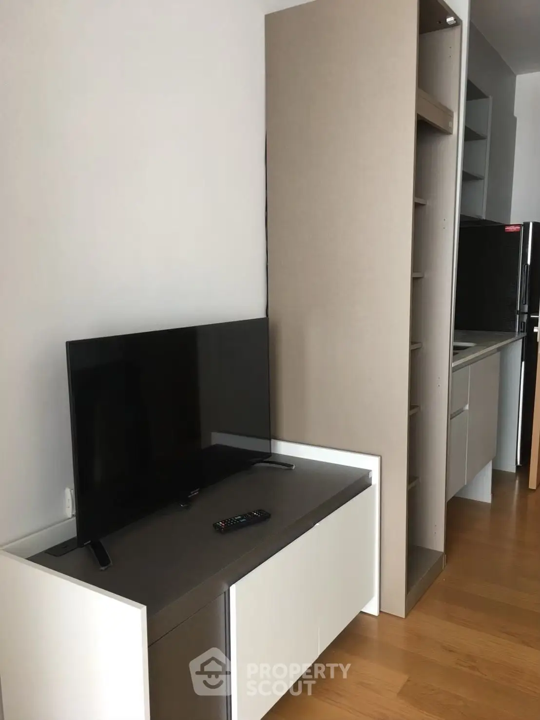 Modern living room with sleek TV setup and minimalist design