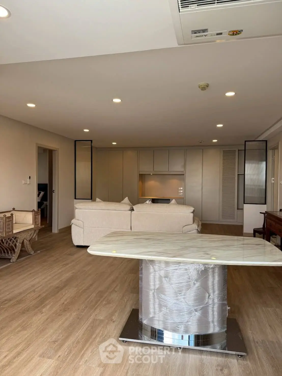 Spacious modern living room with open layout and elegant furniture