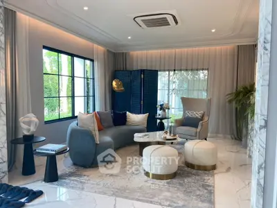 Luxurious living room with elegant furniture and large windows, featuring a modern design and cozy ambiance.
