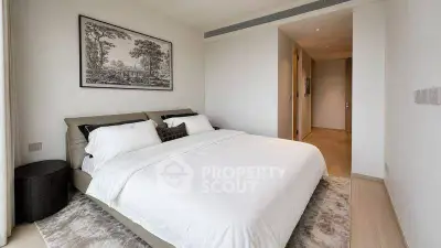 Spacious modern bedroom with elegant decor and cozy ambiance