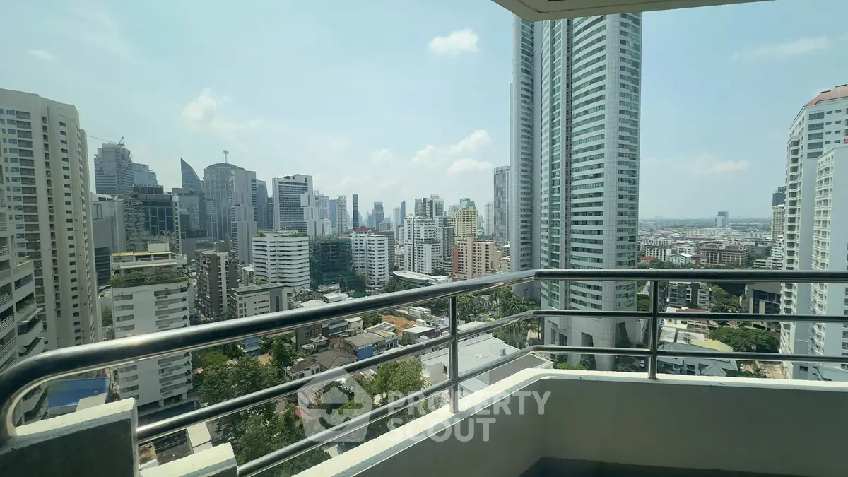 Stunning cityscape view from a high-rise balcony, perfect for urban living enthusiasts.