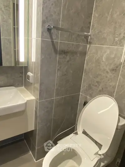 Modern bathroom with sleek design and elegant marble tiles