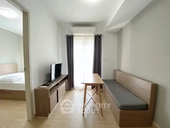 Modern living room with sleek furniture and natural light