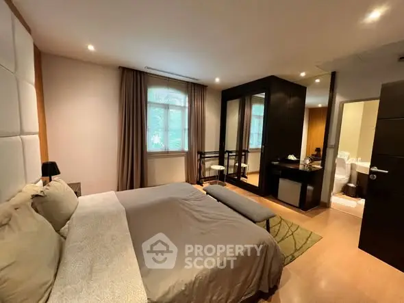 Luxurious bedroom with modern decor and ensuite bathroom