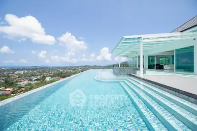 Luxurious infinity pool with stunning panoramic city and ocean views