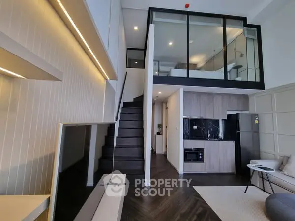 Modern duplex apartment with sleek interior design and open layout