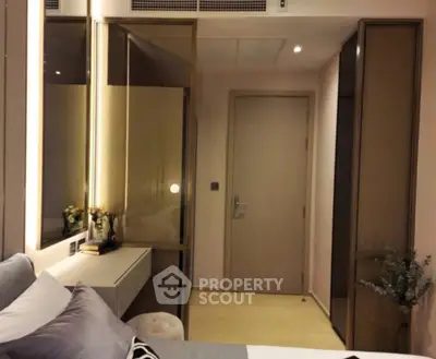 Modern bedroom with sleek design and ambient lighting