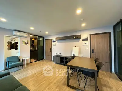 Spacious modern living room with stylish furniture and open layout